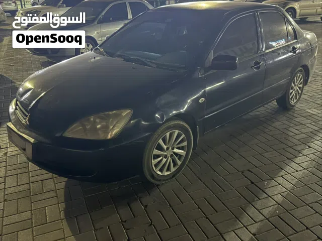 2012 ميتسوبيشي لانسر Standard