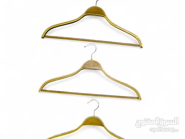 Wooden Hangers Used Good Condition Price per pc 0.300 fils only Qty 300 pc Available