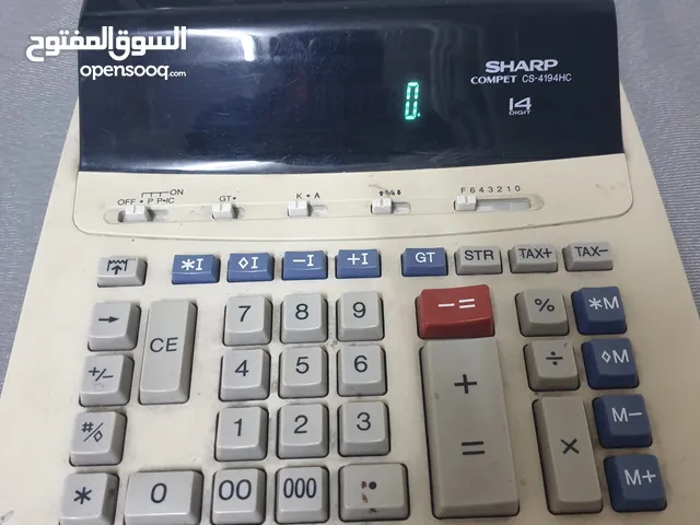 آلة حاسبة ماركة SHARP