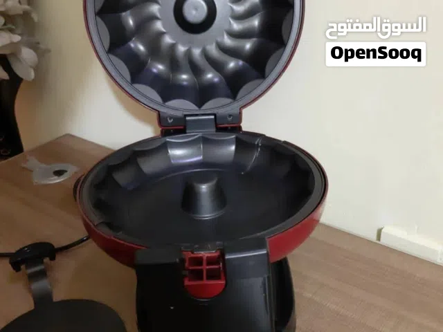 جهاز صانع الكيك شبه جديد