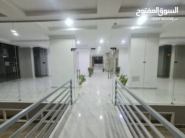 يوجد لدينا شقة للايجار في أبو حليفه قطع 2 عماره جديده تشطيب سوبر لوكس للاستفسار