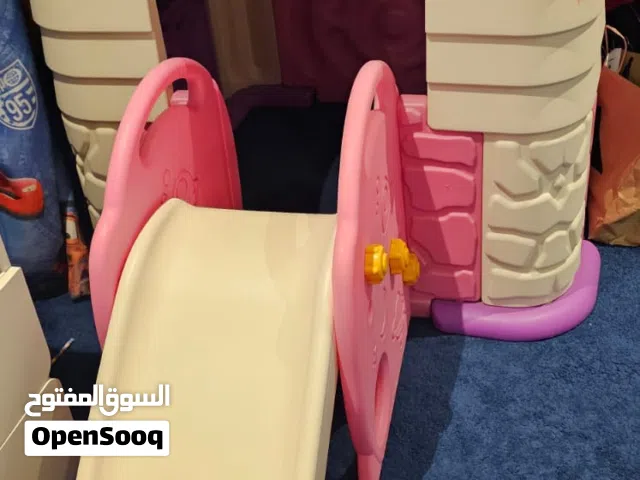 Kids playing house with slide in a good condition