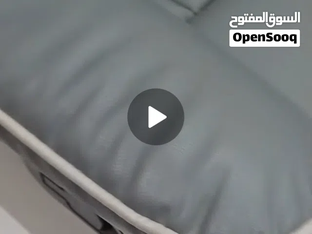 كرسي هزاز لون رمادي