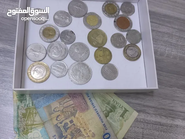 عملات معدنية وأ ورقية قديمة أجنبية وعربية نادرة