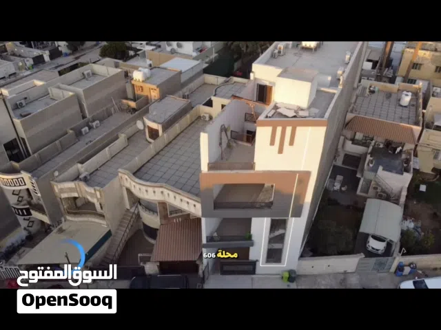 القادسية بناية سكنية 4 طوابق تصلح للاستثمار او سكن مساحة 240 م