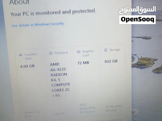 laptop with charger and mouse