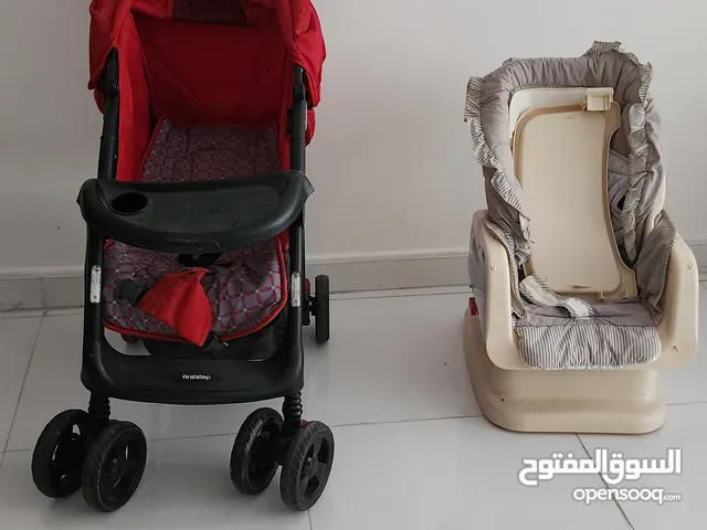 عربية اطفال مع كرسي طفل هزاز