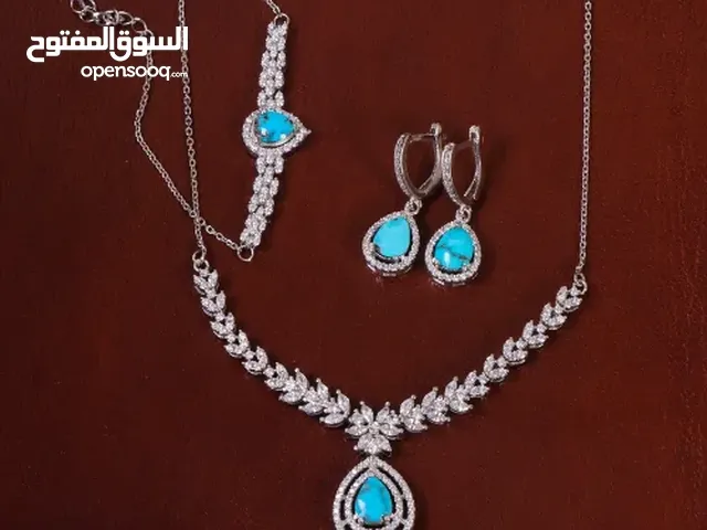 طقم فيروز نسائي (عقد وأقراط وسوار)