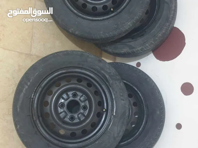 Bridgestone 14 Tyre & Wheel Cover in Tripoli