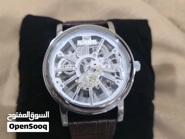 ساعه ماركه نور مجان اصليه مع ضمان سنه كامله معها في البوكس ومع مصر نصف ترمة باللون البني عرض محدود