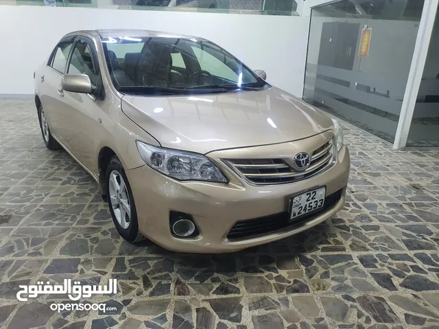 تويوتا كورولا موديل 2013 فرخ الكامري . ماتور 1800cc . فحص كامل . بحالة الوكالة