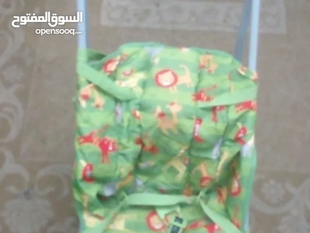 مجموعة اغراض اطفالمكونة من عرباية وكوتة وجهاز معدةرياضي للكبار كلهن ب 10