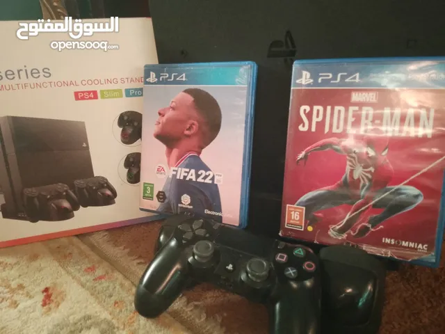 PS4 pro with 2 controller and fifa22 spider man cd's and charger stan 1tb