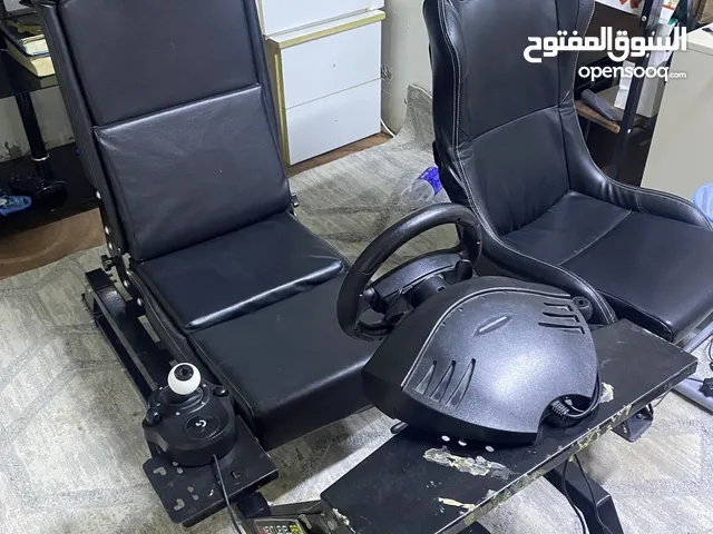 Gaming chair with steering and accelerator