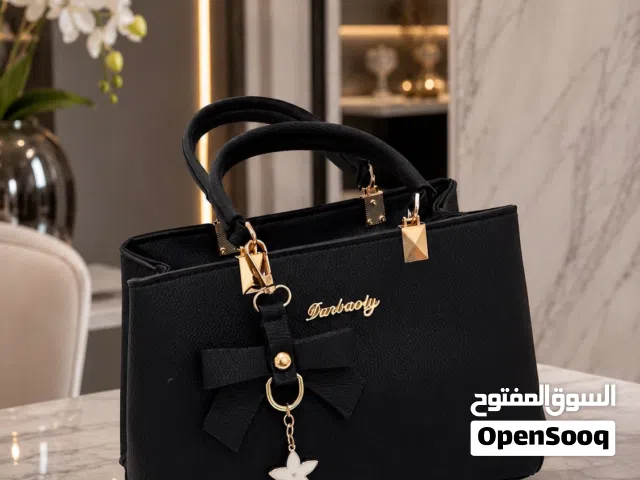 شنطة أنيقة بتصميم فاخر - لمسة فخامة لكل إطلالة