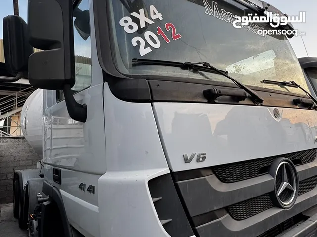 خلاطة اسمنت 12 متر على سيارة مرسيدس مديل 2012 بحالة ممتازة جدا 12 متر