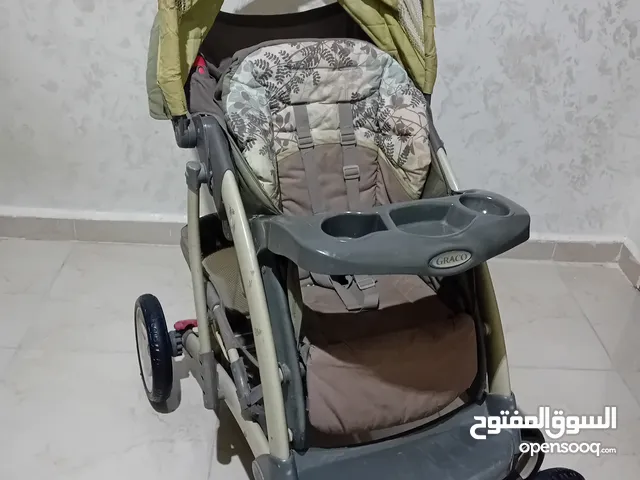 عرباي أطفال ماركة " GRACO " اوروبيه بحالة ممتازه حجم جامبو ، فخمه وثقيله و عمليه جدااا