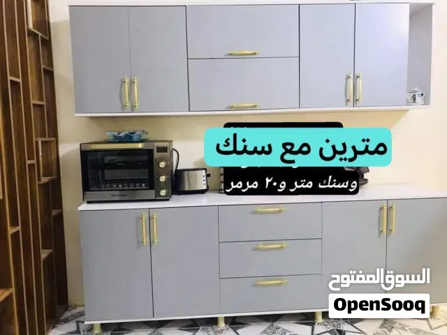 كاونتر mdf  القياس مترين ارضي وملحق مع سنك متر و20