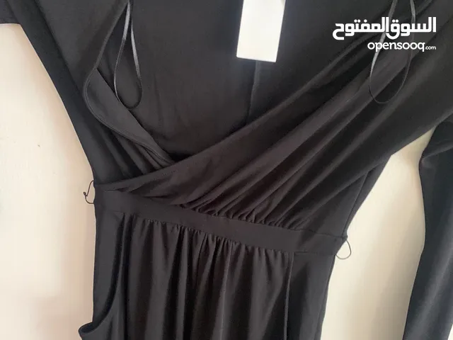 Women black new dress with the label