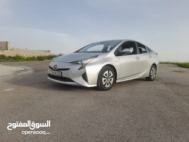 تويوتا بريوس هايبرد موديل 2018 جمرك جديد لون سلفر ليثيوم