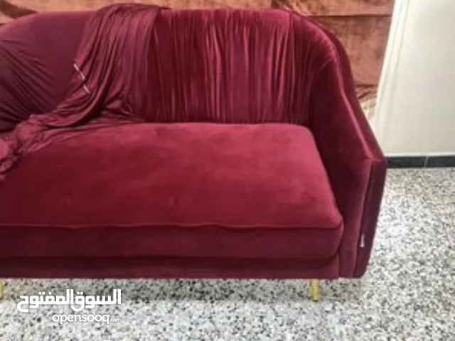 Sofas red with cover