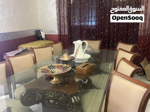 طاولة سفرة 10 مقاعد مع بوفيه وخزانة