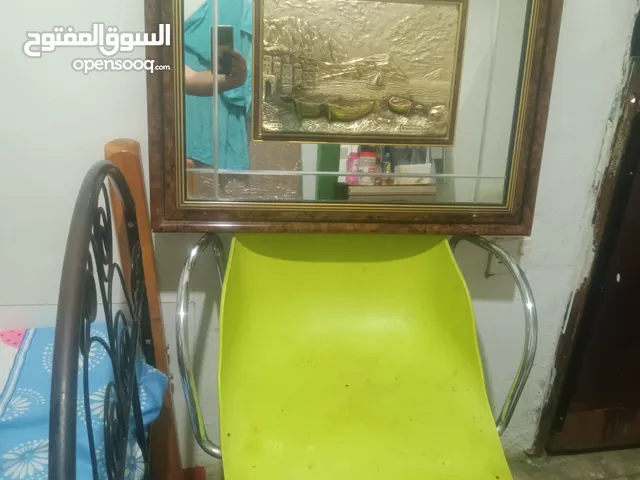 كرسي متحرك مكنب فايير في استالس وتابلوه ازاز ليزر في نحاس