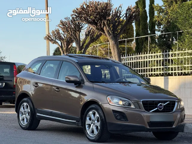 ڤولڤو XC60 موديل 2010 لون بني فل أوبشن اعلى صنف فحص كامل بحالة