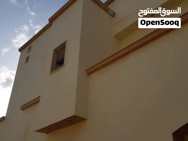 منزل للبيع في طريق السور بالقرب من معسكر 77 ثلاثة أدوار وملحق