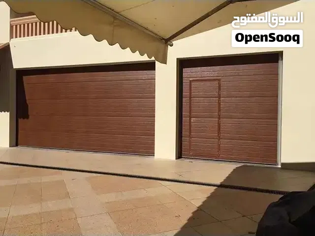 Sectional overhead door new & repair, Rolling shutters new and repairing Garage door parking gates.