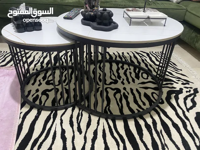 طاوله وسط سيراميك والقاعده حديد