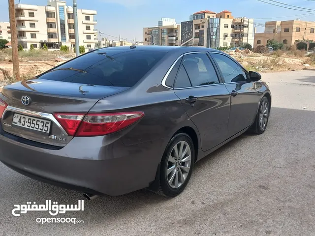 تويوتا كامري لون فيراني مميز 2015 فل الفل بفتحه فحص 2 جيد بسعر مغري قابل للبدل