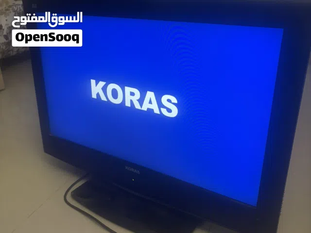 شاشة تلفزيون مع طاولة صالون