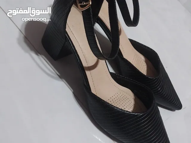 Black With Heels in Amman