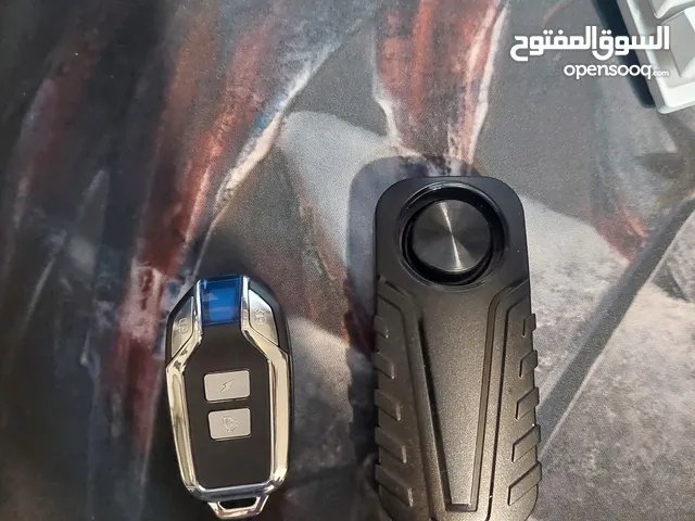 جهاز إنذار للدراجات وصندوق شاحن السيارات الكهربائيه