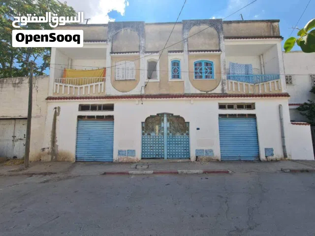 À Vendre : Immeuble Mixte avec Fort Potentiel d’Investissement