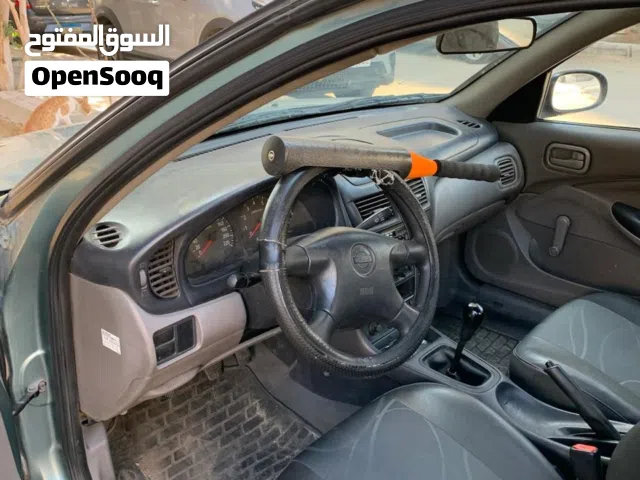 نيسان صنى 2002 دواخل فابريكا