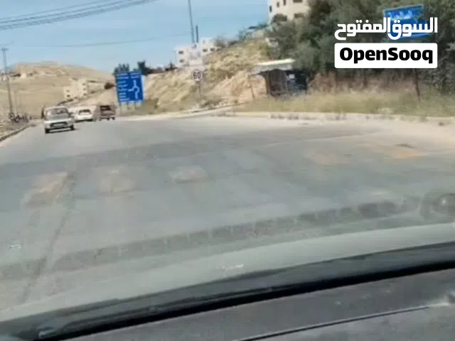 ارض طريق السخنة على شارع الرئيسي و شارعين جانبي  بسعر مغري للبيع او الاستثمار