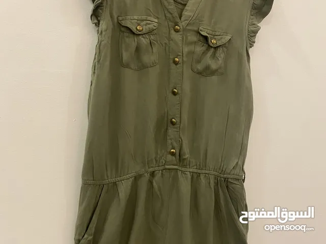جمبسوت شورت لون زيتي لعمر 12_13 عام