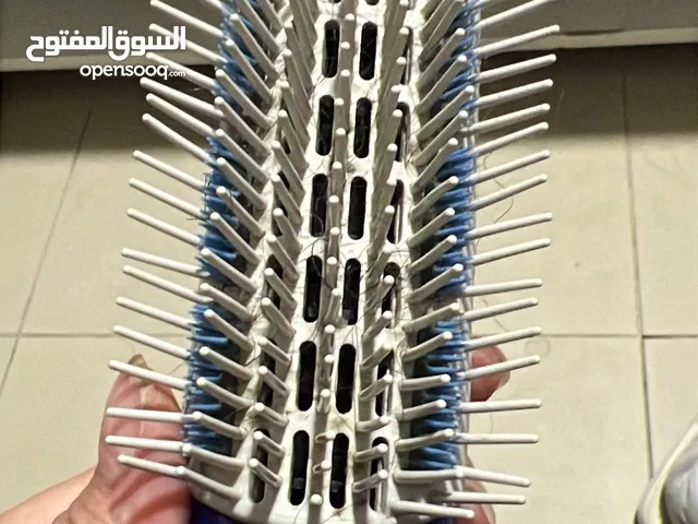 مشط كهربائي