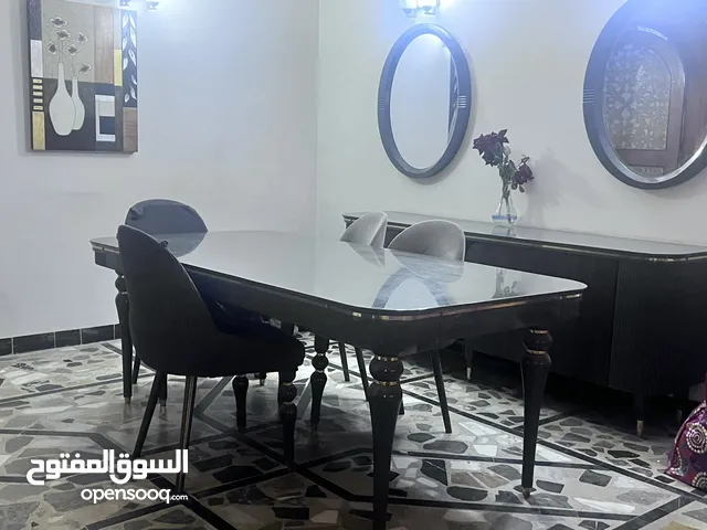 ميز طعام وست كراسي مع بوفيه وامرايه