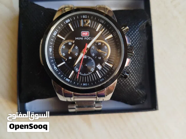 ساعة رجالية أنيقة ماركة MINI FOCUS بحالة ممتازة مع الملحقات