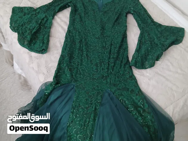 فستان اخضر ثقيل جديد