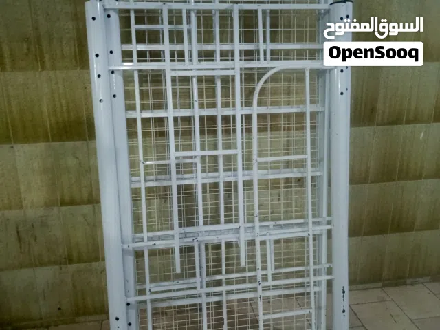 سرير حديد دورين ودولاب كبت