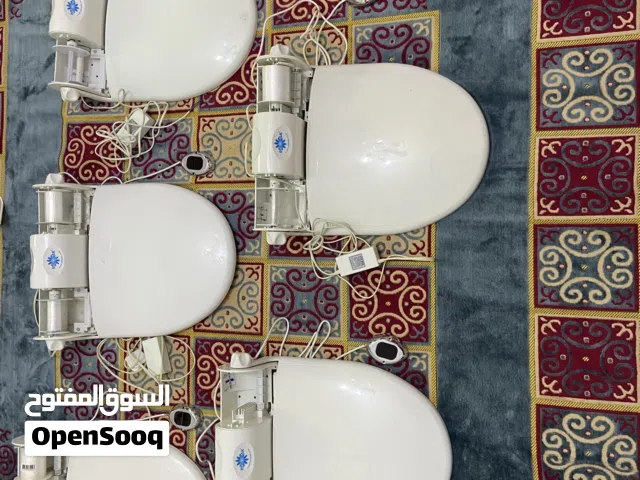 غطاء ذكي لكرسي حمام غير مستعمل لكن غير جديد