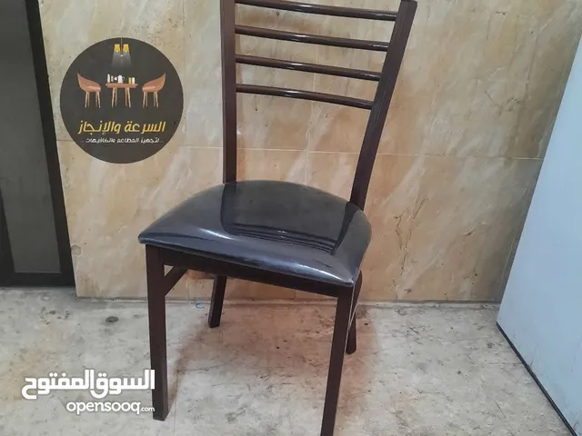 كراسي خشب وحديد
