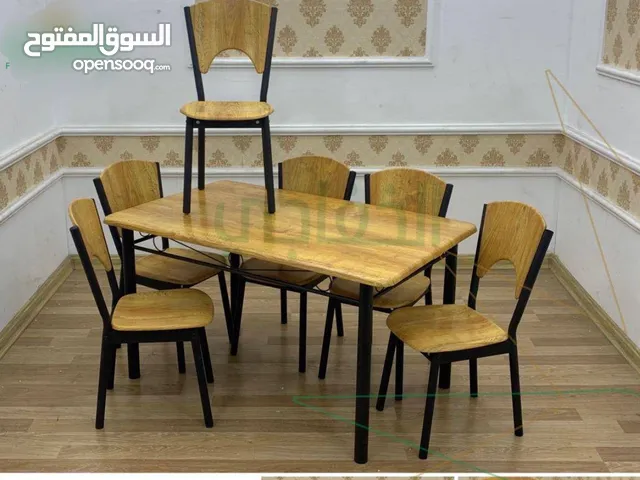 ميز طعام 6 كرسي حديد وخشب