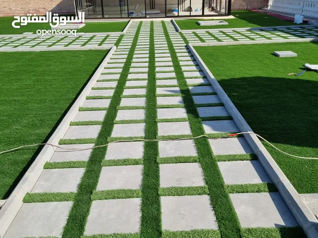 معلم بلاط متداخل وكربستون تركيب مصافط السيارات تركيب التيل الصناعي