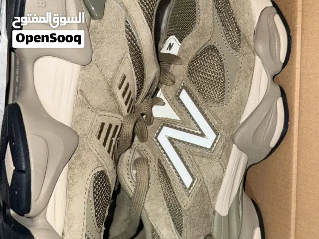 Beige shoes brand : Milano  Size: 40  Price : 8bhd  Green shoes brand: new balance  Size: 41 1/2