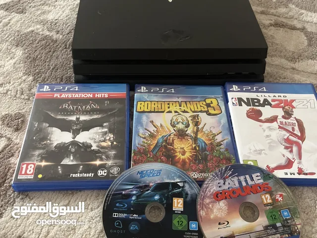 Playstation 4 Pro with 5 different games